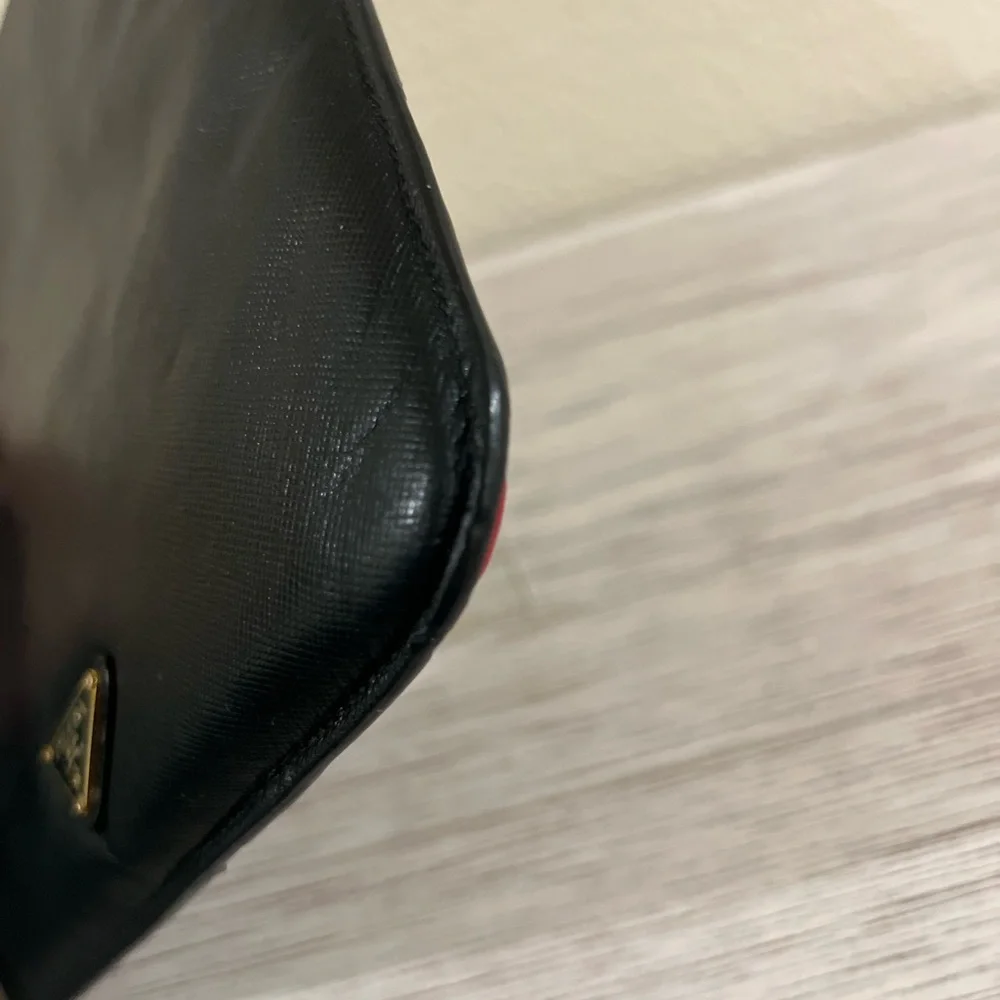 PRADA Red and Black Saffiano Leather iPad Sleeve with flame 🔥